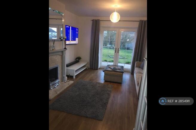 Sitting Room With Patio Doors To Garden