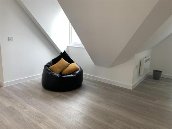 Bright modern chill-out area with bean bag...