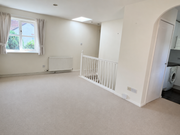 Open plan lounge with juliet balcony