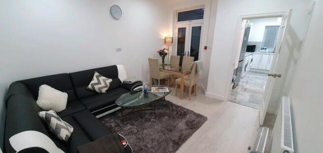 Modern lounge with comfy sofa and dining area...