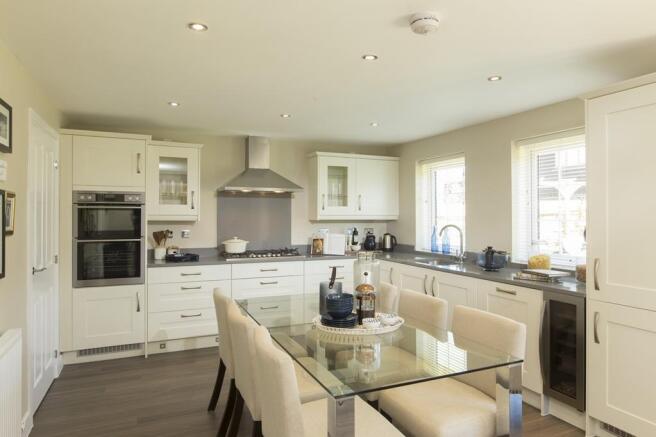 Open-plan kitchen with breakfast and family areas