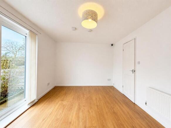Bright living area with modern wooden flooring...