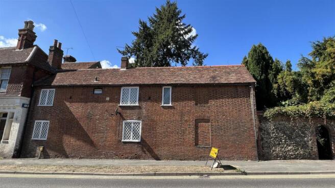 Charming brick-front property on a sunny street...