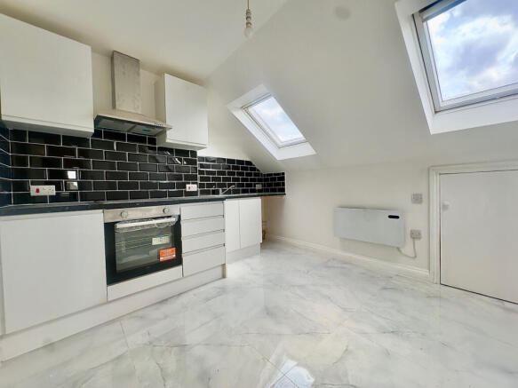 Spacious Two Bedroom Top Floor Flat available to