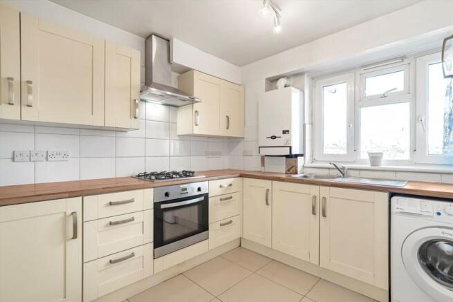 Bright modern kitchen with ample storage...