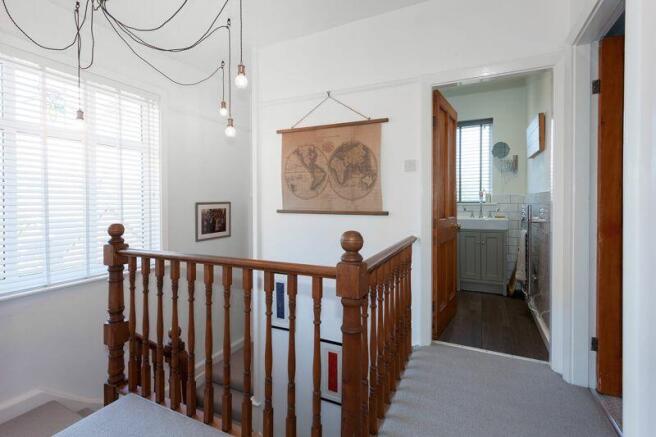 SPLIT LEVEL GALLERIED LANDING