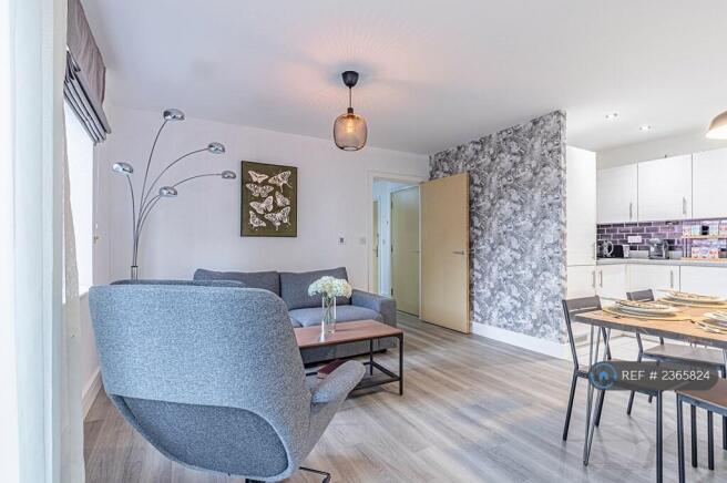 Living Room With Sofa Bed, And Modern Decor.