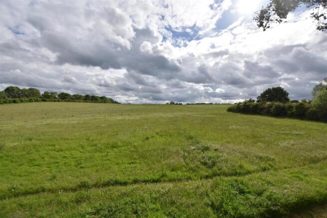 OPEN MEADOW VIEWS TO REAR