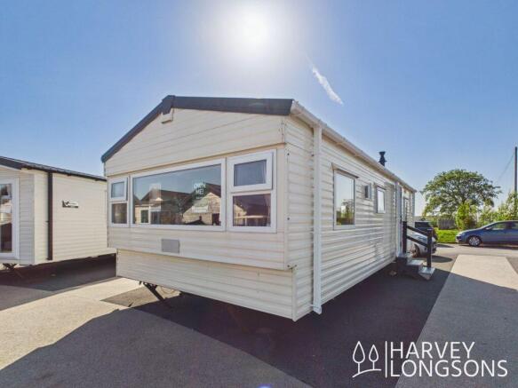Radiant static caravan exterior at holiday park