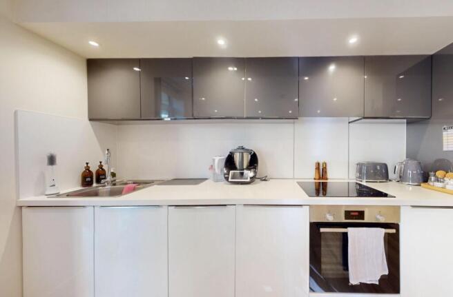 Modern and clean kitchen with ample storage, br...