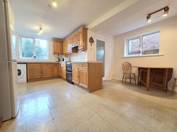 Kitchen With Dining Area