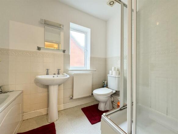 FAMILY BATH AND SHOWER ROOM