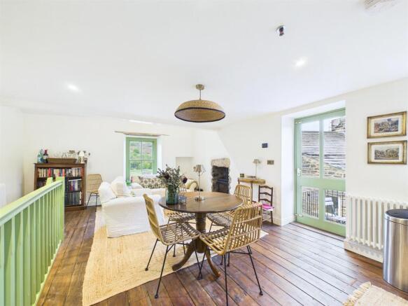 Dining and Doors to Balcony