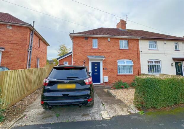 Front shot of property and driveway..jpg
