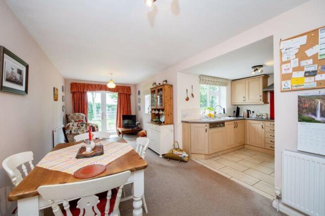 Living/dining room through kitchen