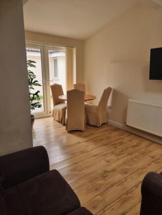 Bright, well-presented reception area with wood...
