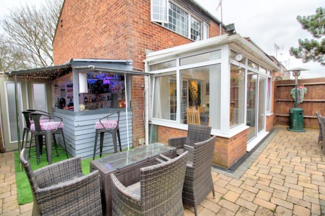 Rear patio/bar/conservatory view