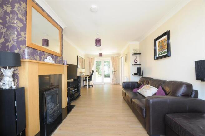 Living room to rear.