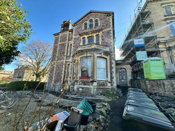 Charming front view of a historic property show...