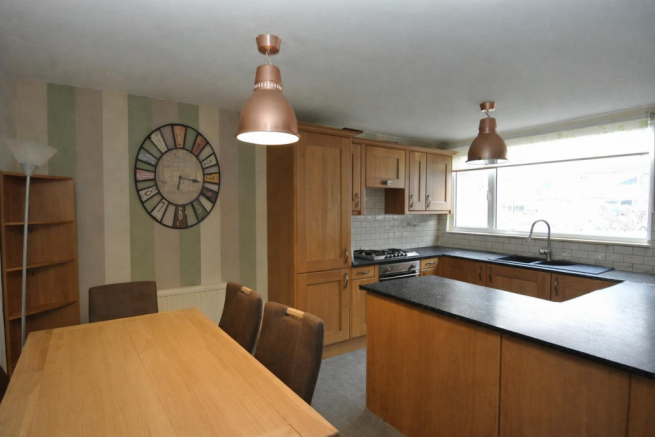 Modern kitchen and cozy dining area.png