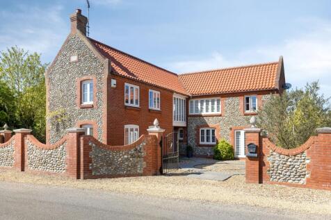 Detached Home Framed by Open Countryside in Weasenham