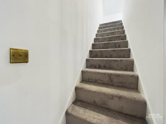 Stairs to top floor