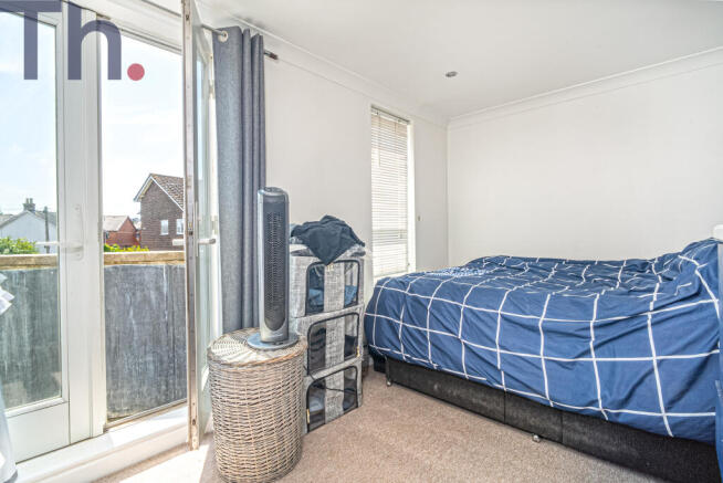 Bedroom With Balcony