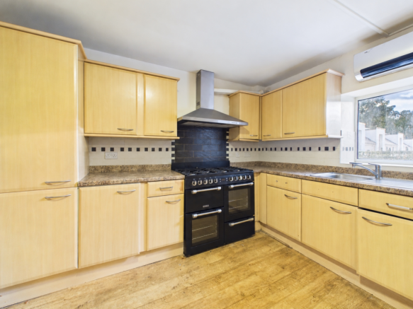 Bright kitchen with cleared countertops