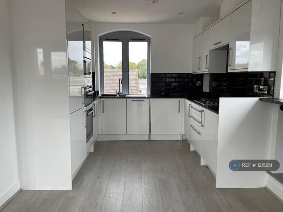 Kitchen Area With Granite Worktops