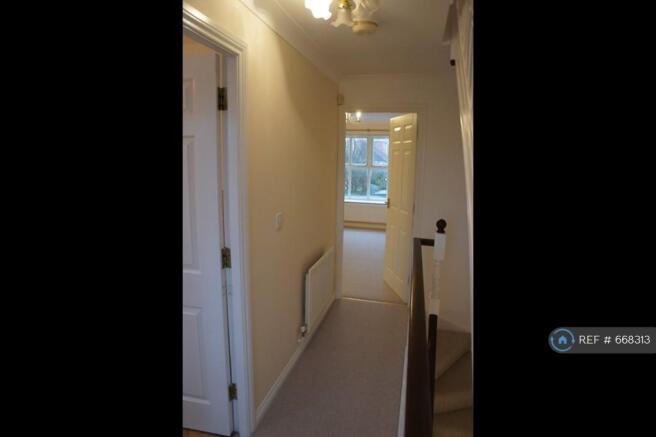 First Floor Hallway To Living Room