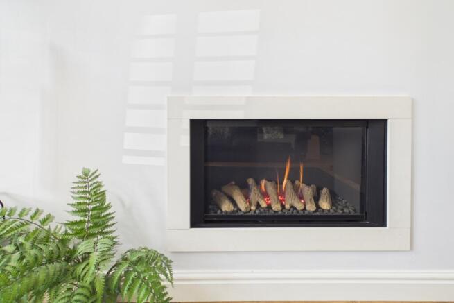 Modern remote controlled gas fire in the lounge to