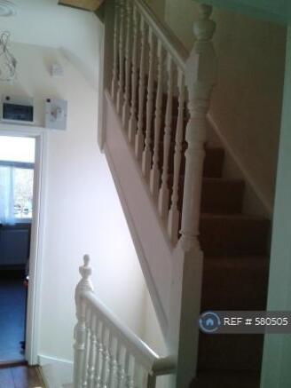 Staircase To a Large Bed Upstairs