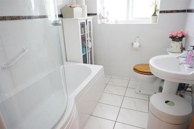 FULLY TILED BATHROOM