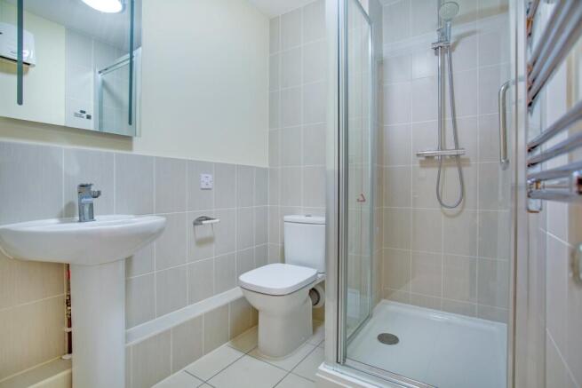 a bathroom with a glass shower