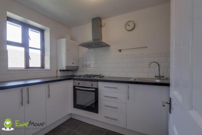 Modern kitchen overlooking communal gardens