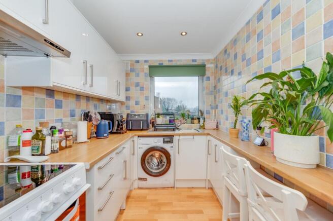 SITTING ROOM AND KITCHEN