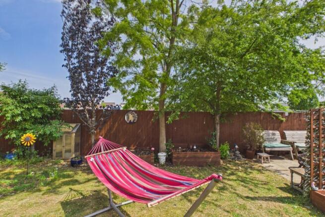 Imagine relaxing in this sun soaked garden in the 