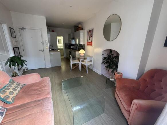 Open plan sitting room and kitchen