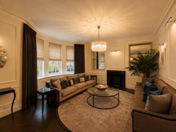 Spacious living room with elegant plush seating...