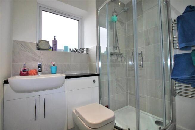 Modern bathroom with sleek walk-in shower...