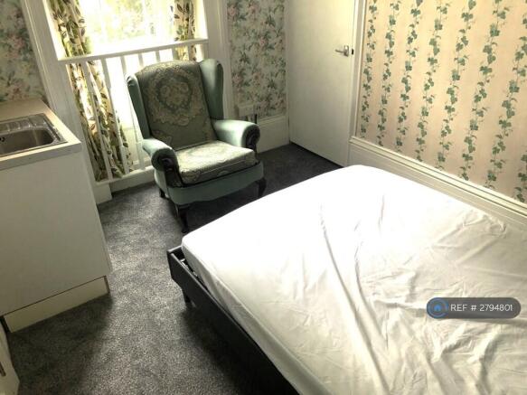 Bedroom With Private Kitchenette