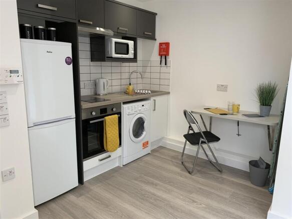 Modern kitchen with integrated appliances...