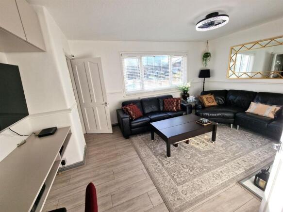 A modern and inviting living room featuring a l...