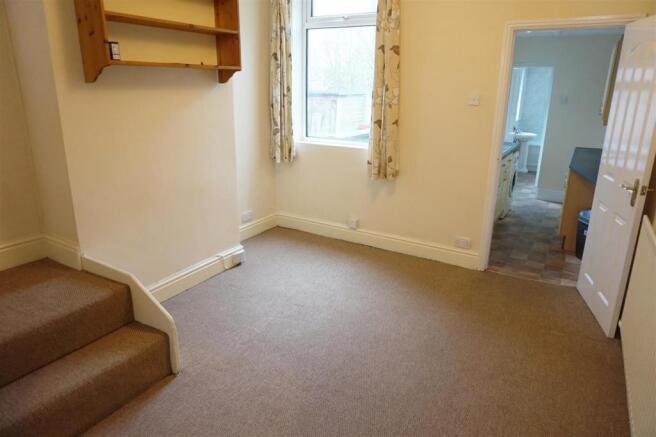 THROUGH LOUNGE/DINING ROOM