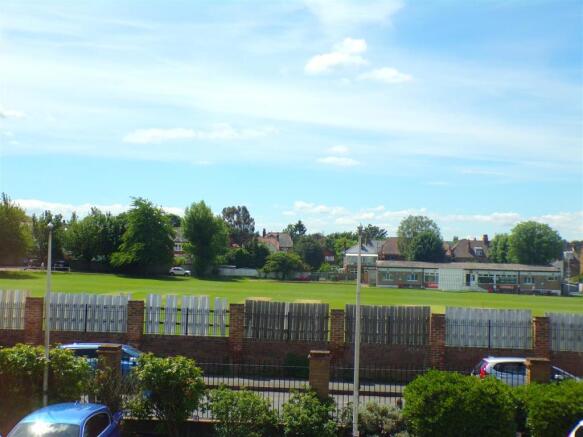 VIEW FROM BEDROOM OVER BAT & BALL PLAYING FIELDS