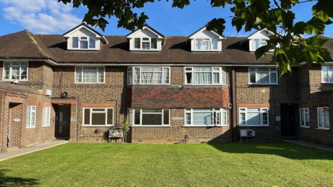 Charming brick property with a spacious lawn...