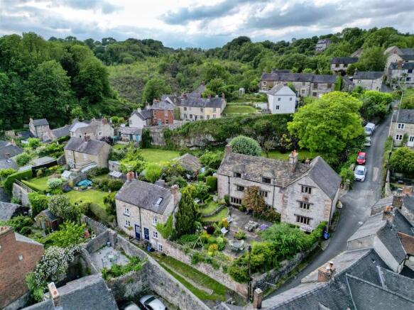 Aerial shot of House, gardens and cottages.jpg