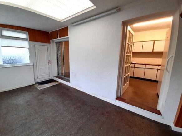 Sun Room into Kitchen/Dining Room