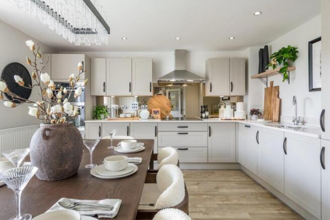 Kitchen with dining table in 4 bed detached home