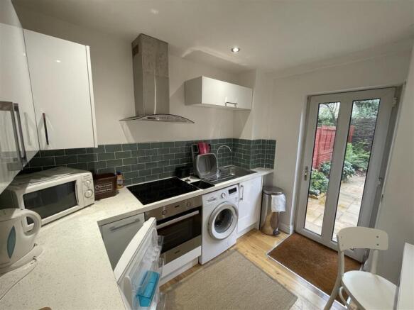 Bright modern kitchen with direct garden access...
